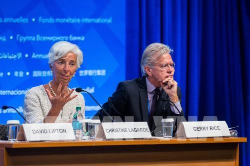 IMF memperingatkan konfrontasi dagang akan membuat prospek pertumbuhan ekonomi global menjadi redup - ảnh 1