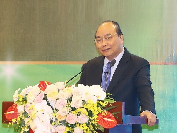 PM Nguyen Xuan Phuc: mengubah pola fikir agraris semata-mata menjadi ekonomi pertanian dan melakukan  integrasi yang intensif dan ekstensif - ảnh 1