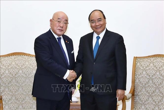 PM Vietnam, Nguyen Xuan Phuc menerima Isao, Iijima penasehat khusus dari PM Jepang - ảnh 1