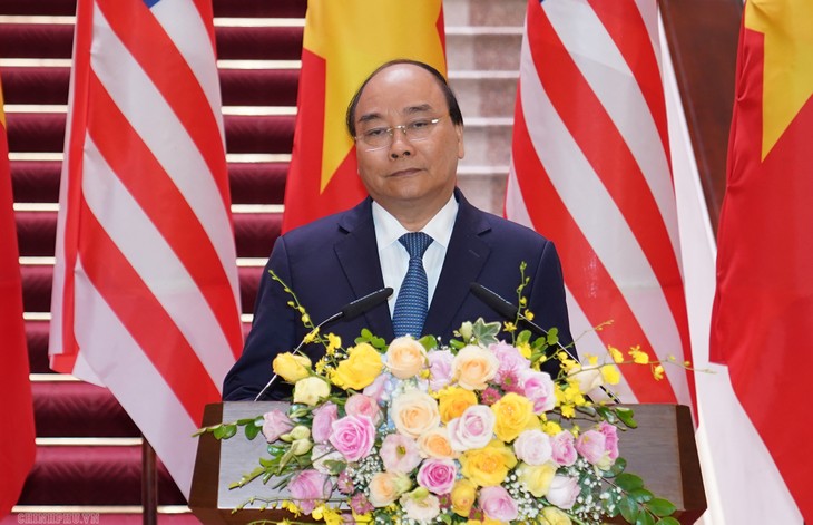 Thủ tướng Nguyễn Xuân Phúc đón, hội đàm với Thủ tướng Malaysia - ảnh 13