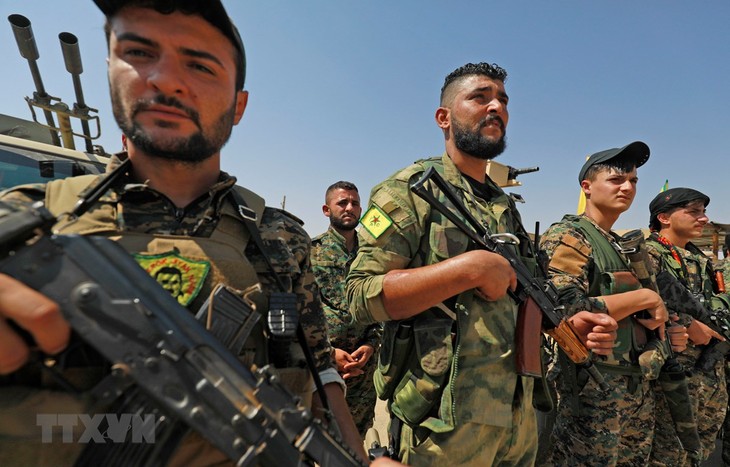 Pasukan-pasukan orang Kurdi sedang menarik diri dari kawasan perbatasan Suriah Utara - ảnh 1