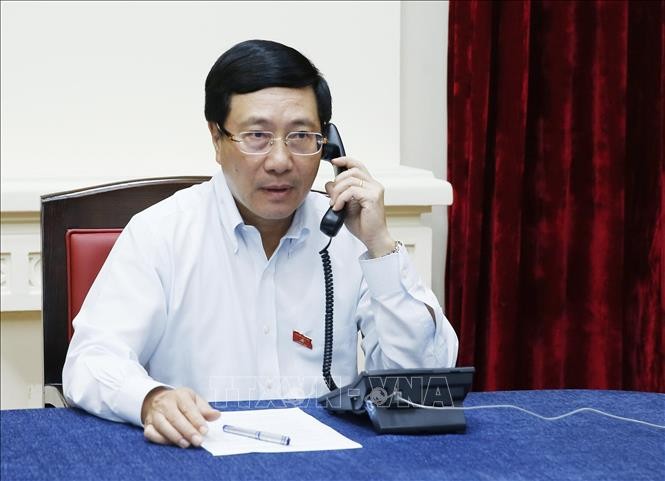 Deputi PM, Menlu Vietnam, Pham Binh Minh Adakan Pembicaraan Telepon dengan Menlu Singapura, Vivian Balakrishnan - ảnh 1