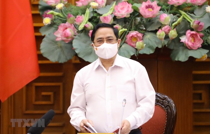 PM  Pham Minh Chinh Imbau Seluruh Warga Bersinergi dengan Pemerintah Untuk Kendalikan Wabah Covid-19 - ảnh 1