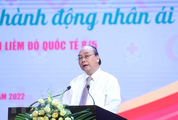 Presiden Nguyen Xuan Phuc: Kegiatan Sukarela dan Kemanusiaan Adalah Tanggung Jawab Bersama Seluruh Masyarakat - ảnh 1