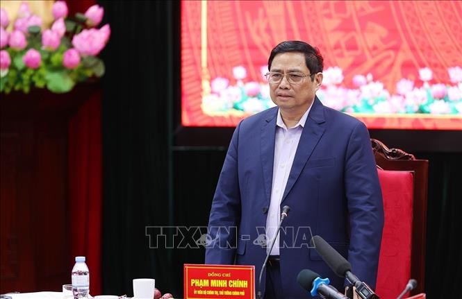 PM Pham Minh Chinh Bekerja dengan Badan Harian Komite Partai Komunis Provinsi Son La - ảnh 1