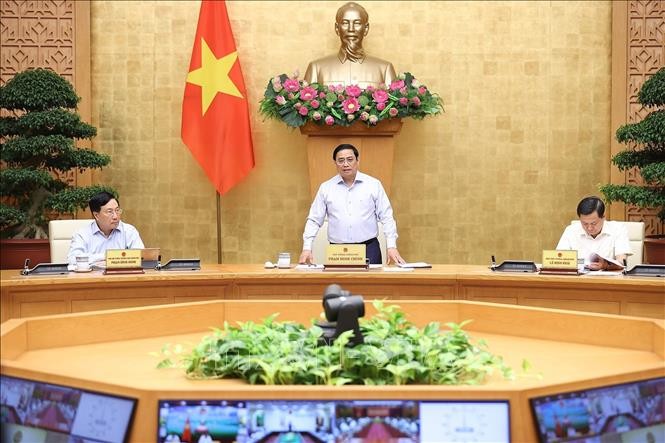 PM Pham Minh Chinh Tekankan Terus Menstabilkan Ekonomi Makro, Menjamin Pertumbuhan Pada Beberapa Bulan Akhir  Tahun - ảnh 1