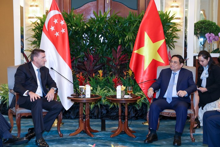 PM Pham Minh Chinh Meminta Bank Standard Chartered untuk Membantu Vietnam di Sektor Keuangan - ảnh 1