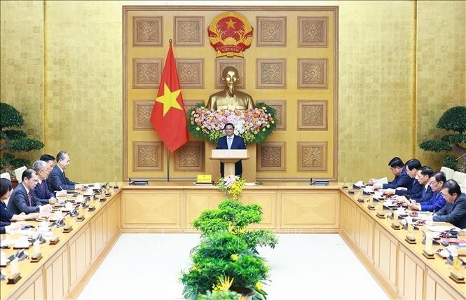 PM Vietnam, Pham Minh Chinh Memimpin Simposium dengan Rombongan Badan Usaha Papan Atas Tiongkok tentang Ekonomi Hijau dan Ekonomi Digital - ảnh 1