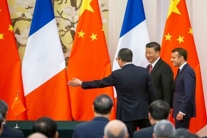 A Pékin, Emmanuel Macron et Xi Jinping unis dans la critique de Donald Trump - ảnh 1