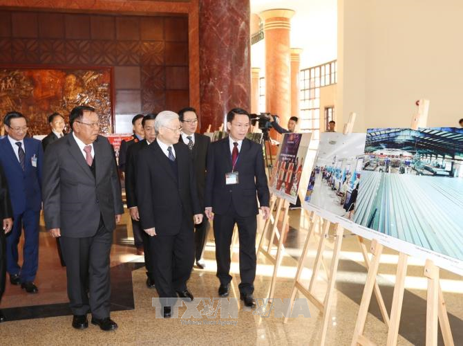Vietnamese, Lao leaders vow to boost special ties  - ảnh 1