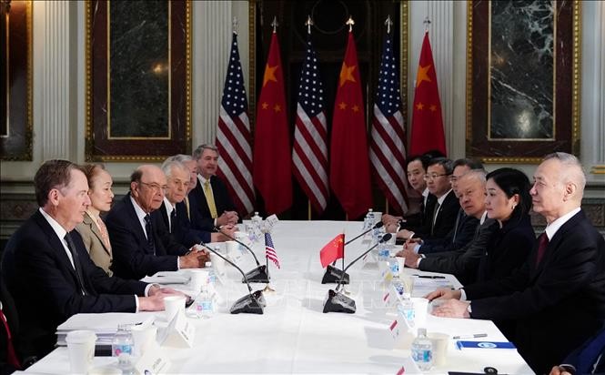 US, China start new round of trade talks - ảnh 1