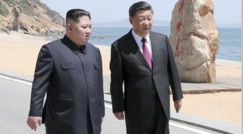 Presiden Tiongkok, Xi Jinping melakukan pembicaraan dengan pemimpin RDRK, Kim Jong-un - ảnh 1