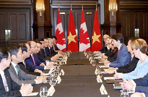 PM Viet Nam, Nguyen Xuan Phuc mengakhiri kehadiran di KTT G7 yang diperluas dan kunjungan-nya di Kanada - ảnh 2
