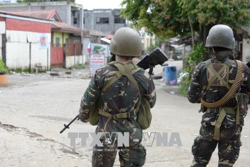 Tentara Filipina  berbaku tembak dengan sisa-sisa pasukan IS - ảnh 1