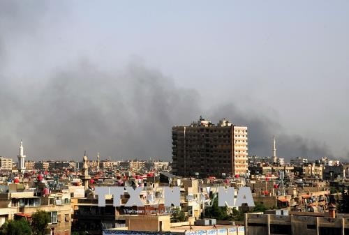 Irak melakukan serangan udara membasmi IS di Suriah - ảnh 1