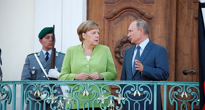 Pemimpin Rusia dan Jerman membahas serentetan masalah - ảnh 1