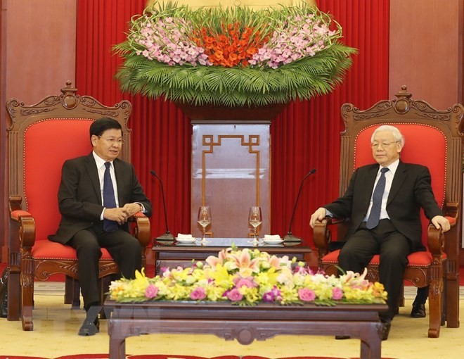 Sekjen KS PKV Nguyen Phu Trong menerima PM Laos, Thongloun Sisoulith - ảnh 1