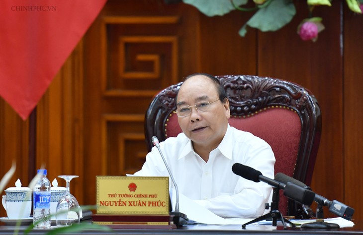 PM Nguyen Xuan Phuc memimpin persidangan tentang penyelenggaraan upacara besar Weisek 2019 - ảnh 1