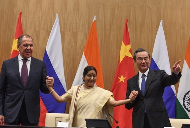 Rusia-Tiongkok-India sepakat mendorong sistem multilateral dengan PBB sebagai inti - ảnh 1