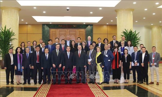 Kepala Departemen Ekonomi KSPKV, Nguyen Van Binh menerima delegasi Dewan Bisnis AS-ASEAN - ảnh 1