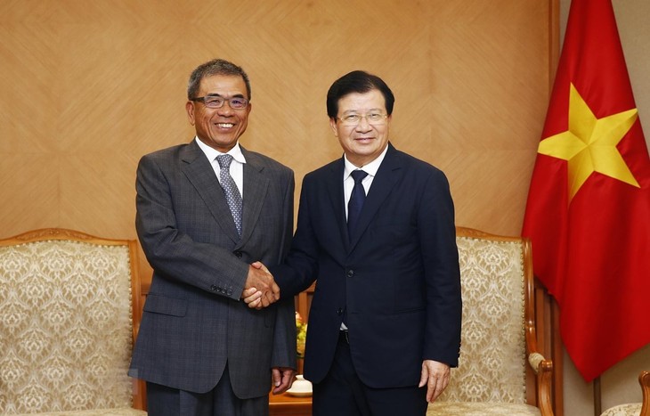 Deputi PM Vietnam, Trinh Dinh Dung menerima Wakil Presiden Grup Compal - ảnh 1