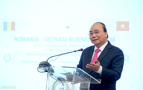 PM Vietnam, Nguyen Xuan Phuc menghadiri Forum Badan Usaha Vietnam-Rumania - ảnh 1