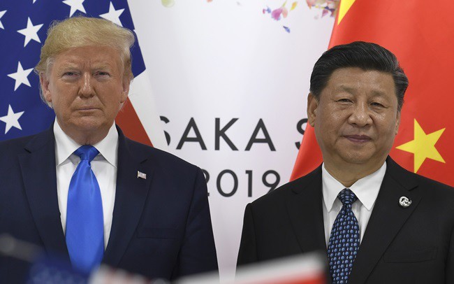 Dampak gencata senjata perdagangan antara AS dan Tiongkok - ảnh 1
