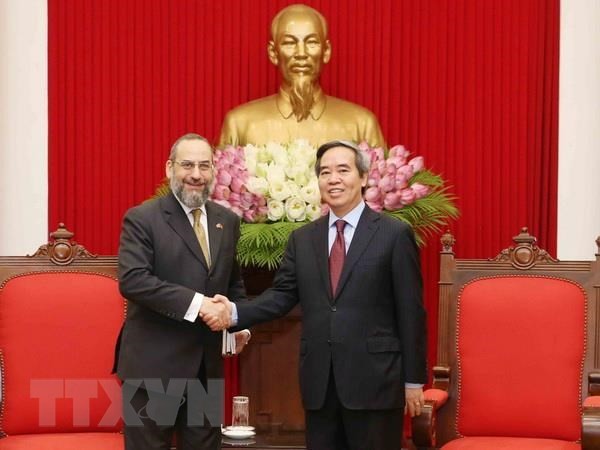 Kepala Departemen Ekonomi KS PKV, Nguyen Van Binh menerima kepala delegasi Kementerian Keuangan AS, Michell Silk - ảnh 1