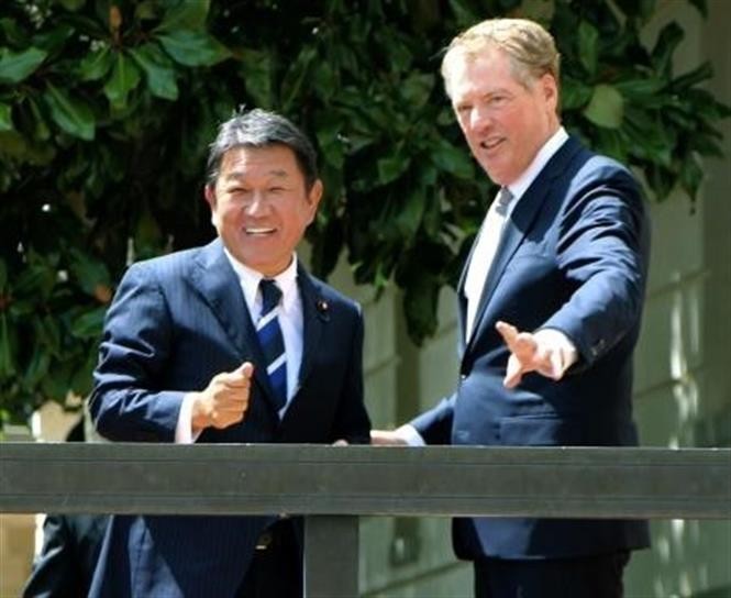AS dan Jepang mencapai kesepakatan tentang permufakatan dagang - ảnh 1