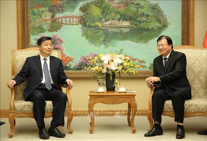 Deputi PM Trinh Dinh Dung menerima Wakil Gubernur Provinsi Guangdong, Tiongkok - ảnh 1