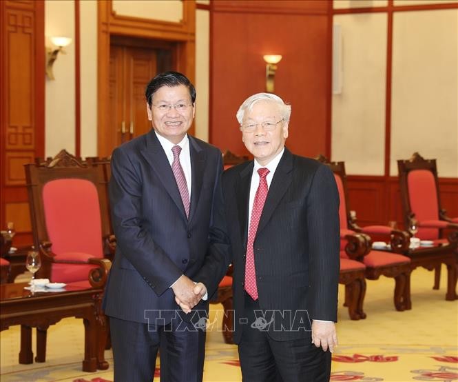 Sekjen, Presiden Nguyen Phu Trong menerima PM Laos, Thongloun Sisoulith - ảnh 1