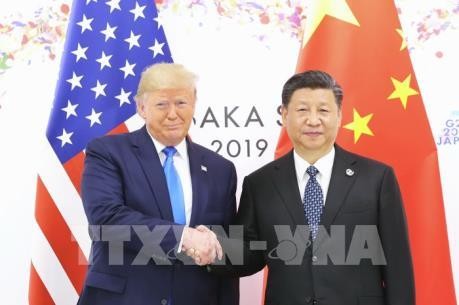 Pemimpin AS-Tiongkok Melakukan Pembicaraan Telepon tentang Masalah Perdagangan dan Hubungan Bilateral - ảnh 1