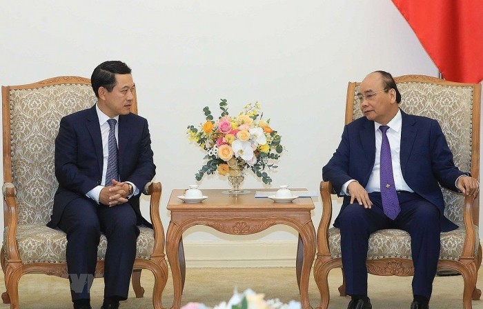 PM Nguyen Xuan Phuc Menerima Menlu Laos, Saleumxay Kommasith - ảnh 1