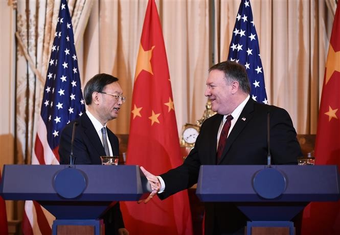 Para pejabat diplomat Tiongkok dan AS melakukan pembicaraan telepon tentang wabah Covid-19 - ảnh 1