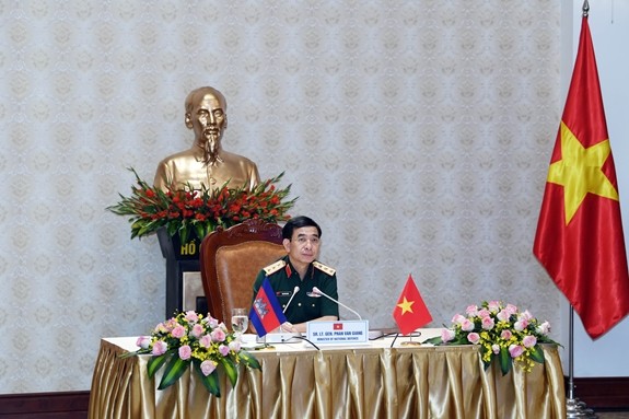 Vietnam dan Kamboja Perkuat Kerja Sama Pertahanan Keamanan,  Saling Mendukung di Berbagai Forum Multilateral - ảnh 1