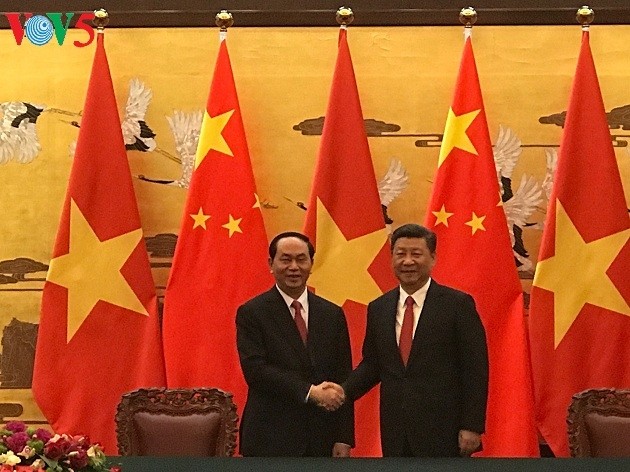 Staatspräsident Tran Dai Quang führt Gespräch mit dem chinesischen Staatspräsident Xi Jinping - ảnh 1