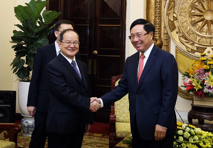 Vize-Premierminister, Außenminister Pham Binh Minh empfängt Parteichef des Autonomiegebiets Guangxi Zhuang, Lu Xinshe - ảnh 1