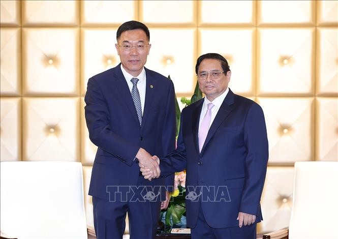 Premierminister Pham Minh Chinh empfängt Führungskräfte großer chinesischer Unternehmen - ảnh 1