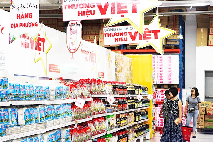 베트남 상품 소비 촉진, 국내 시장 발전에 기여 - ảnh 1