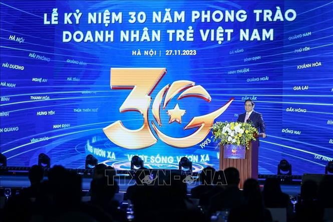 팜 민 찐 총리, 베트남 청년 기업가 운동 30주년 기념식 참석 - ảnh 1