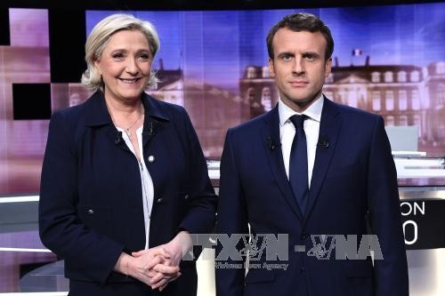 ប៉ូលីសបារាំងចាប់ខ្លួនជនជាប់សង្ស័យក្នុងការវាយប្រហារលើគេហទំព័ររបស់ បេក្ខជនប្រធានាធិបតី Marie Le Pen - ảnh 1