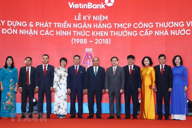 នាយករដ្ឋមន្ត្រីលោក Nguyen Xuan Phuc អញ្ជើញចូលរួមពិធីរំលឹកខួបលើកទី៣០ឆ្នាំនៃការកសាងនិងអភិវឌ្ឍន៍ Vietinbank  - ảnh 1