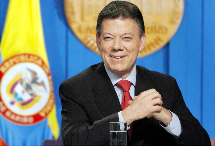ប្រធានាធិបតីកាន់អំណាចរបស់ Colombia លោក Juan Manuel Santos បានជាប់ឆ្នោតជាថ្មីម្តងទៀត - ảnh 1