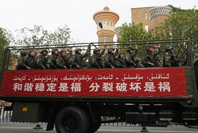 ជនស៊ីវិលចំនួន ៣៧ នាក់ត្រូវស្លាប់ក្នុងការវាយប្រហារភេវរកម្មនៅ Xinjiang របស់ចិន  - ảnh 1