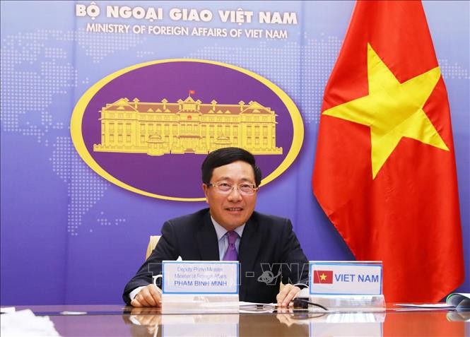 Deputi PM, Menlu Pham Binh Minh menghadiri Konferensi Menlu G20 secara online - ảnh 1