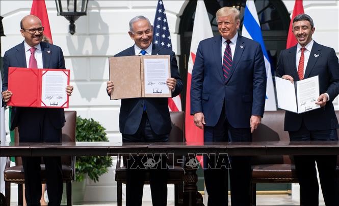 Israel menandatangani permufakatan normalisasi dengan UEA dan Bahrain - ảnh 1
