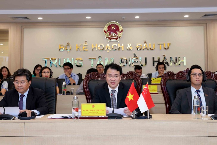 Konferensi promosi investasi Vietnam-Singapura diadakan secara virtual - ảnh 1