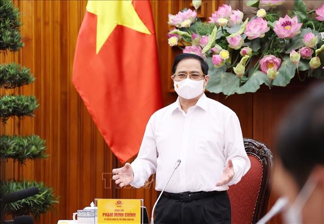 PM Pham Minh Chinh: Pembelian Vaksin Covid-19 Merupakan Kasus Darurat yang Harus Segera Dilaksanakan - ảnh 1