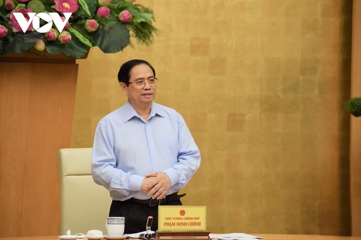 PM Pham Minh Chinh Pimpin Konferensi Virtual antara Badan Harian Pemerintah dengan 27 Daerah Vietnam Selatan tentang Pencegahan dan Penanggulangan Wabah Covid-19 - ảnh 1