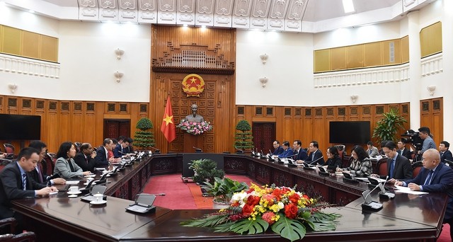 Deputi PM Vietnam, Tran Luu Quang Terima Menteri Kedua Industri dan Perdagangan Singapura - ảnh 1